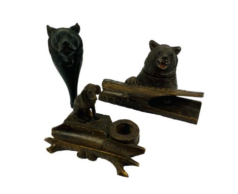 A group of three early 20th century carved Black Forest items; a carved bear nutcracker, 6cms wide x 6.5cms deep x 14.5cms hi