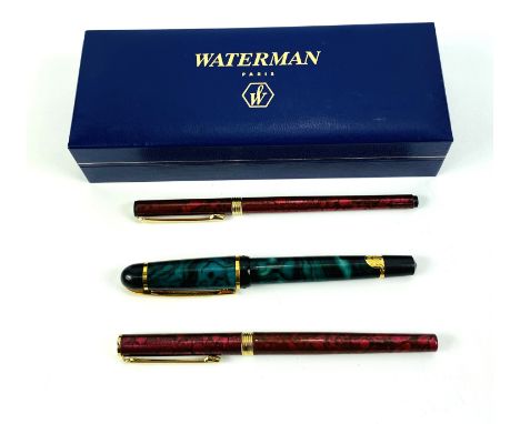 A cased Waterman fountain pen; together with an Italian fountain pen and a Italian pen. Estimate £20-40.