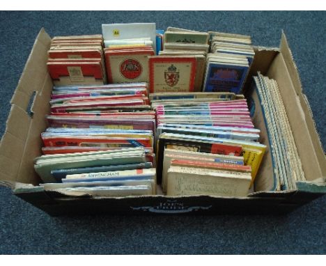 A box of vintage and later OS maps and travel guides 