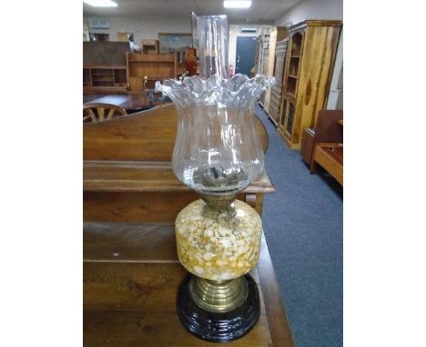 A Victorian oil lamp with coloured glass reservoir, shade and chimney 
