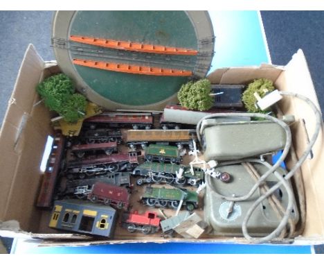 A box containing model train locomotives by Hornby and others, control units, model trees etc.