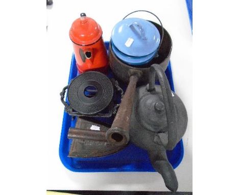 A tray of antique cast iron kettle and trivet, antique flat iron, enamel containers, coffee pot etc 
