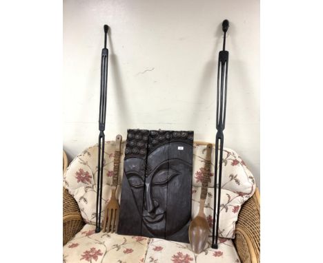 A carved hardwood three piece wall panel together with two tribal figures - lady and gentleman and further wooden oversized s