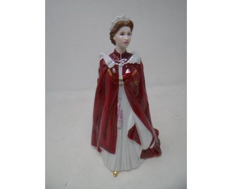 A Royal Worcester china figure celebrating the Queen's 80th birthday, 2006.