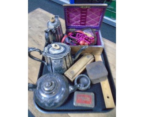 A tray containing antique plated tea wares, a wooden ruler, a vintage jewellery box containing beaded necklaces etc.