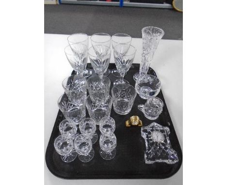 A tray of Edinburgh crystal mantel clock, crystal glasses and tumblers 