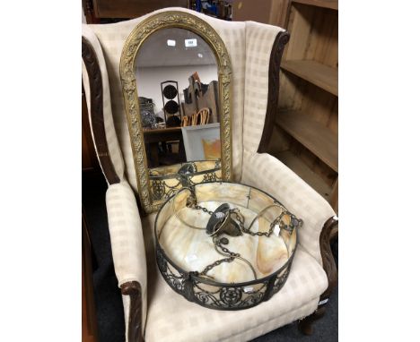 An arch top hall mirror in gilt frame together with a decorative Art Deco metal and glass hanging light fitting.