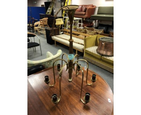 A vintage continental brass six way light fitting 