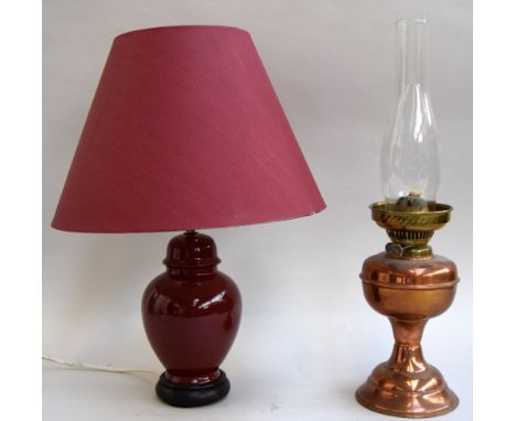A ceramic lamp and shade together with oil lamp and glass chimney with a substantial early 20c gas lamp with gilt decoration 
