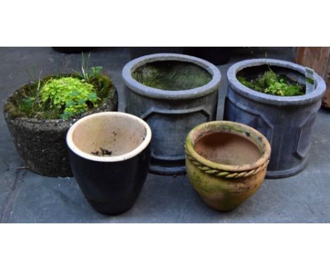 A pair of grey composite planters together with a stone planter and 2 ceramic pots