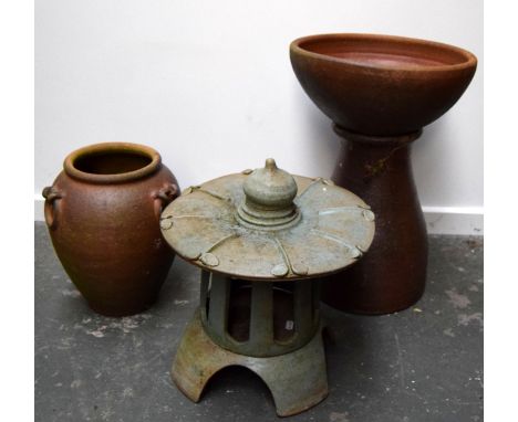 A ceramic planter,terracotta planter and an urn