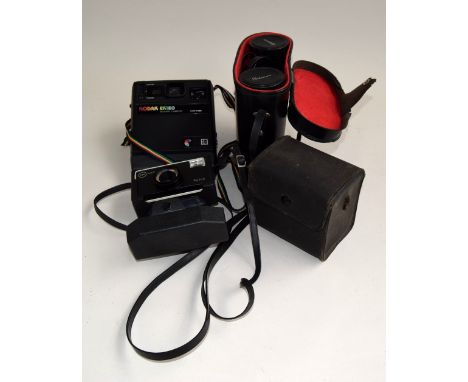 A Kodak box Brownie in case; a Kodak EK160 Instant camera; Kodak 'Instamatic' 56x camera and a pair of Pathescope de Luxe 16 