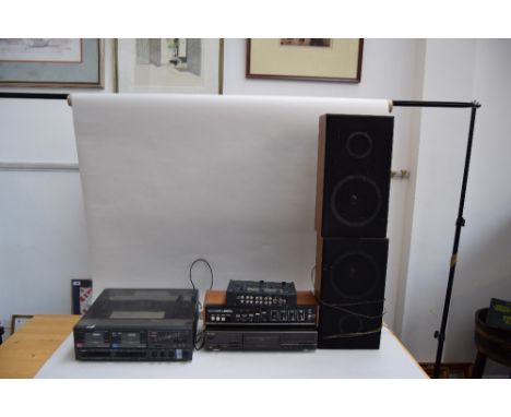 An Alba dual cassette deck, a Technics CD player, an Amstrad IC 2000 MK II automatic quadrosound amplifier, a pair of speaker