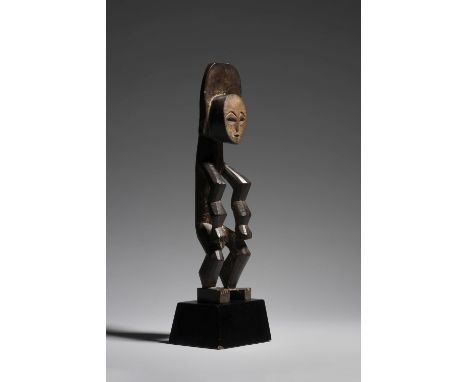 MBOLE FIGURE, DEMOCRATIC REPUBLIC OF THE CONGOofika wood, pigmentsHeight 45 cmProvenanceReputedly Alvin Abrams, New YorkJean 