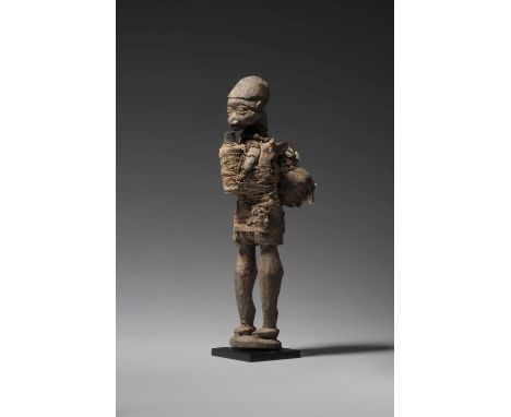 NAGO FIGURE, REPUBLIC OF BENINbocio wood, rope, bones, flask, cowries, plastic, cloth, beads, threads, plant material, clay, 