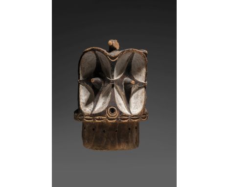 BEMBE HELMET MASK, DEMOCRATIC REPUBLIC OF THE CONGOechawokaba  wood, pigmentsHeight 49 cmProvenanceJacques Blanckaert, Brusse