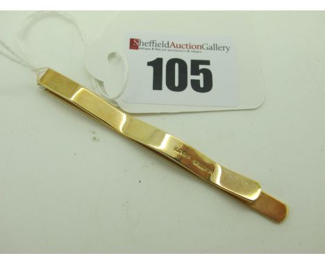 A 9ct Gold Engine Turned Tie Slide, 7cm long.