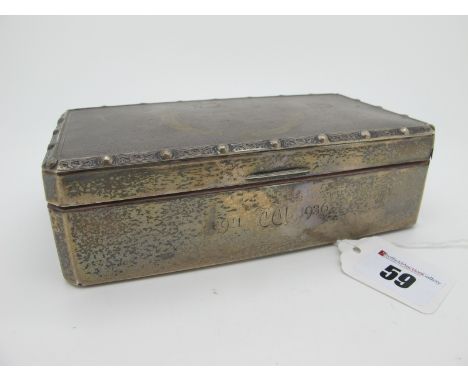 A Hallmarked Silver Cigarette Box, R&amp;S, Birmingham 1936, of plain rectangular form with engine turned lid with Celtic ban