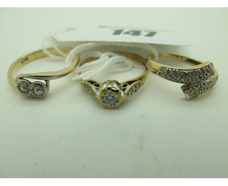 A 9ct Gold Illusion Set Dress Ring, between inset shoulders, another Illusion set dress ring, between crossover shoulders, st