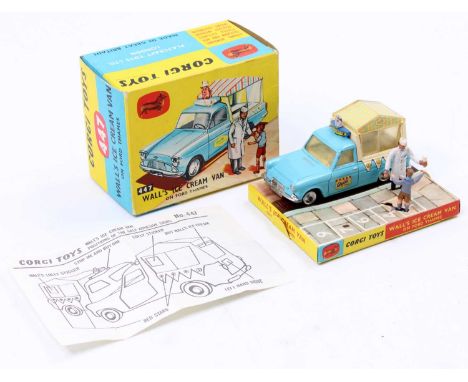 Corgi Toys No. 447 Walls Ice Cream van, comprising of a light blue body with spun hubs with ice cream man vendor figure and a