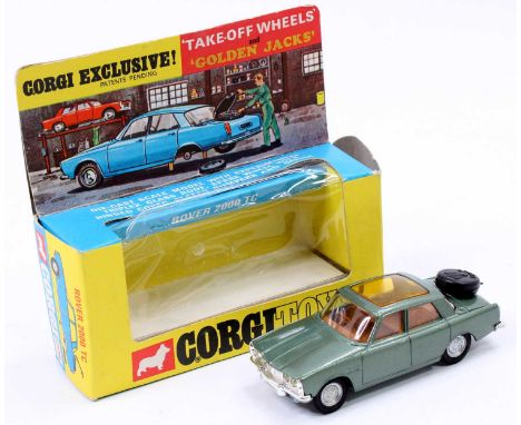 Corgi Toys No. 275 Rover 2000TC comprising of metallic green body with amber glazing and take off wheels, in the original blu