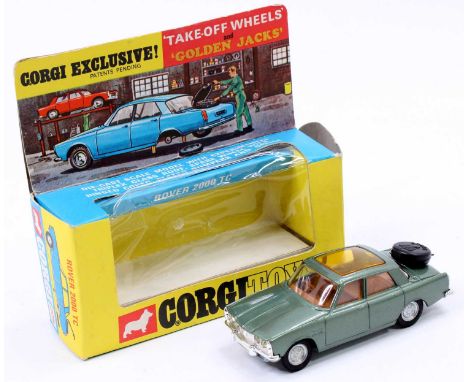 Corgi Toys No. 275 Rover 2000TC comprising of metallic green body with amber glazing and take off wheels, in the original blu