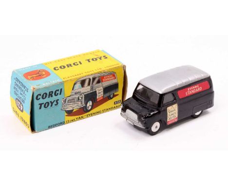 Corgi Toys No. 421 Bedford 12 cwt Evening Standard delivery van comprising of black and silver body with Evening Standard liv