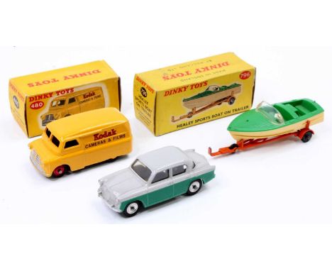 Dinky Toys model group of 3 comprising No. 796 Healey Sports Boat on Trailer, dark green boat with cream hull, orange trailer