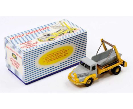French Dinky Toys No. 895 Camion Unic multi marrel skip lorry comprising of yellow and grey body with yellow hubs and grey sk