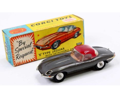 Corgi Toys No. 307 E-type Jaguar E Type with detachable hard top comprising of metallic dark grey body with brown interior an