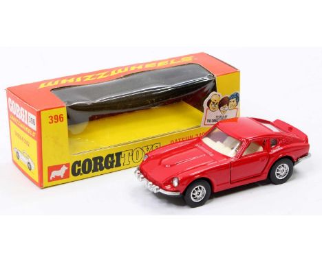 A Corgi Toys Whizzwheels No. 396 Datsun 240Z comprising of red body with off-white interior, housed in the original orange an