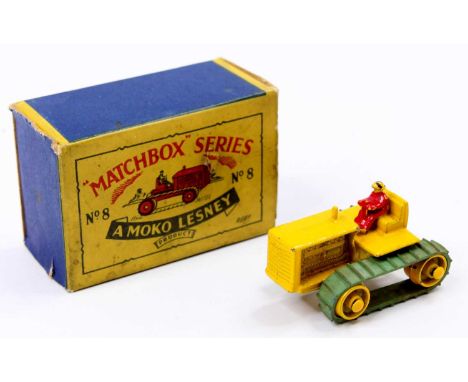 A Matchbox Lesney No. 8 Caterpillar Tractor comprising a yellow body, with yellow painted rollers, and a red driver figure, t