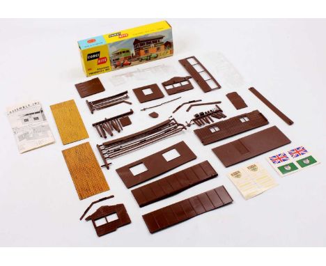 Corgi Kits No. 605 Silverstone Timekeeper's Box comprising various plastic and card components to construct a trackside build