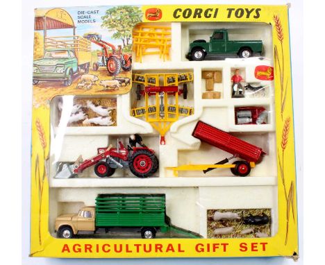 Corgi Toys Gift Set No. 5 "Agricultural" comprising of Massey Ferguson 165 Tractor with shovel, Tandem Disc Harrow, Tipping T