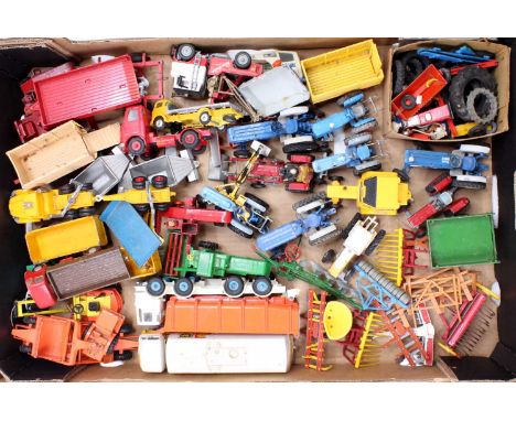 A tray containing a collection of Corgi, Dinky, Matchbox, and Britains farming and construction-related models, with examples