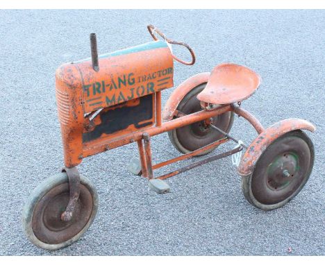 A Triang Major tractor large pressed steel and tin three-wheel pedal tractor, finished in orange with green lettering, green 