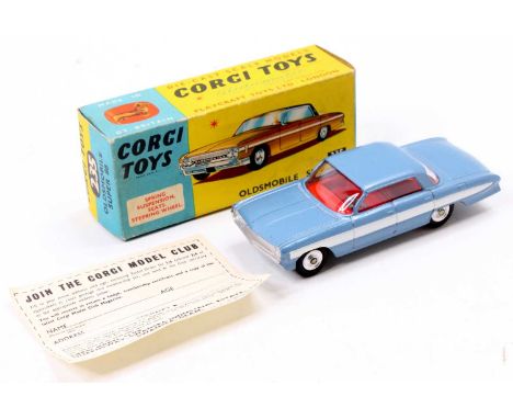 Corgi Toys No. 235 Oldsmobile Super 88 saloon comprising metallic blue body with white side flash and spun hubs, finished wit