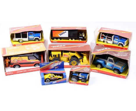 Eight various boxed tinplate and plastic Tonka toys to include a No. 1950 custom van, a No. 1887 Tonka XR-100 tractor shovel,