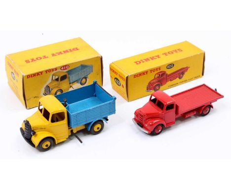 Dinky Toys commercials boxed group of 2 comprising No. 422 Fordson Thames flat truck, red body with matching hubs, in the ori