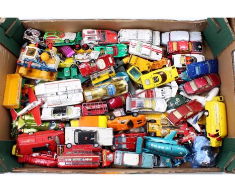 A tray containing a collection of Dinky, Corgi and Matchbox Toys in play-worn condition, with examples including Dinky Toys N