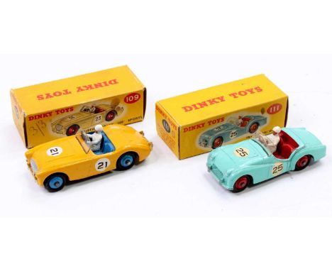 Dinky Toys boxed model group of 2 comprising No. 111 Triumph TR2 sports car, turquoise body with red interior and red hubs, w