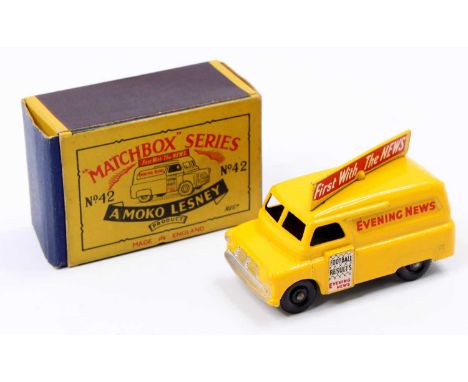 A Matchbox Lesney No. 42 Bedford Evening News Van in yellow with the more difficult-to-find smooth black plastic wheels in th