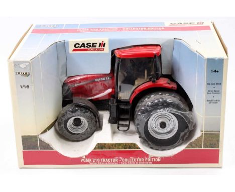 A Britains ERTL 1/16 scale Collectors' Edition model of a Puma 210 dual wheel tractor housed in the original open front polys