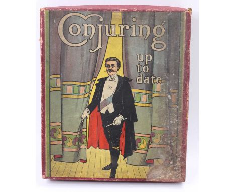 A Chad Valley Conjuring Set from the early 20th Century, contains various "Magic Tricks" and "Illusions", with a conjurers wa