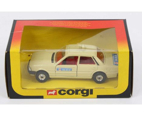 Corgi Toys No. C450 Peugeot 505 taxi with G7 radio stickers to doors and boot, in the original window box, appears as issued 