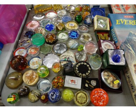 Good collection of various paperweights by Caithness, Murano etc