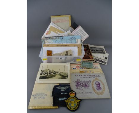 Collection of wartime and later military and prisoner of war memorabilia, a small selection of vintage postcards, some local 