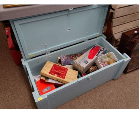 Vintage blue painted wooden trunk with iron carry handles plus the craftwork contents