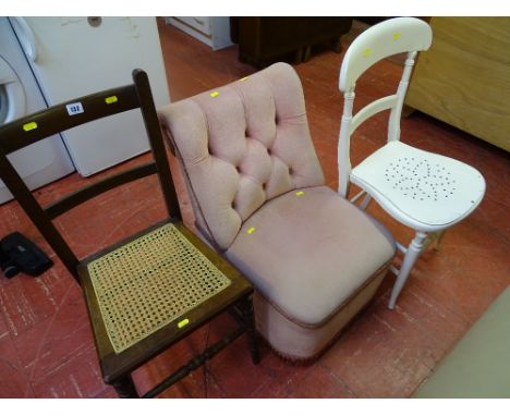 Parcel of three mixed chairs - one white painted, one upholstered button backed chair and a cane seat bedroom chair