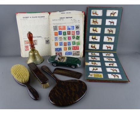 Mixed box of collectables to include a part filled cigarette card album, a small quantity of vintage stamps and first day cov